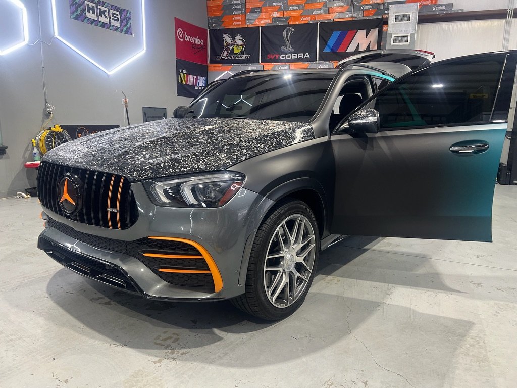 Mercedes-AMG GLE with a forged carbon hood wrap and orange accents